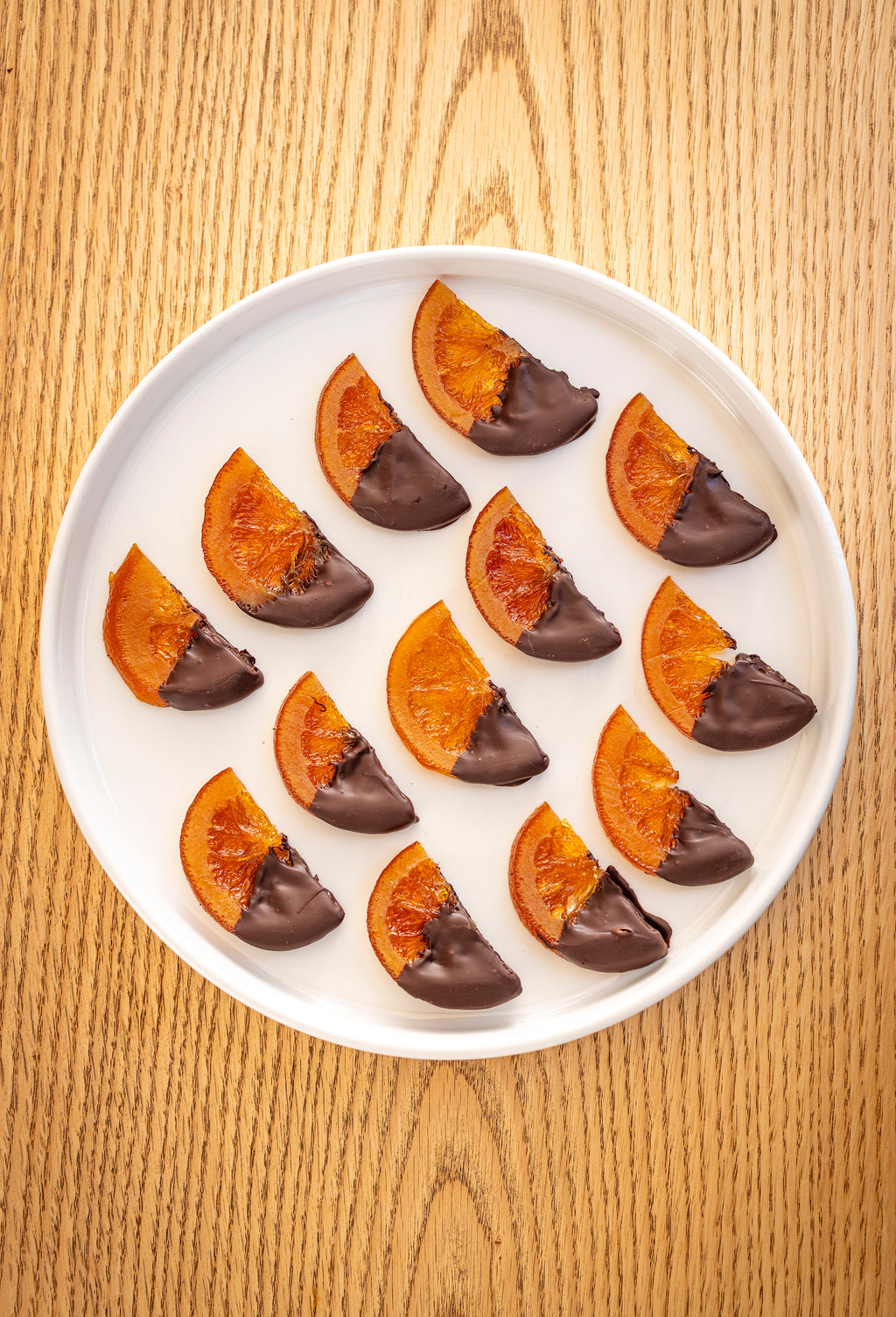 Naranjitas confitadas con chocolate de La Macaria