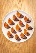 Naranjitas confitadas con chocolate de La Macaria